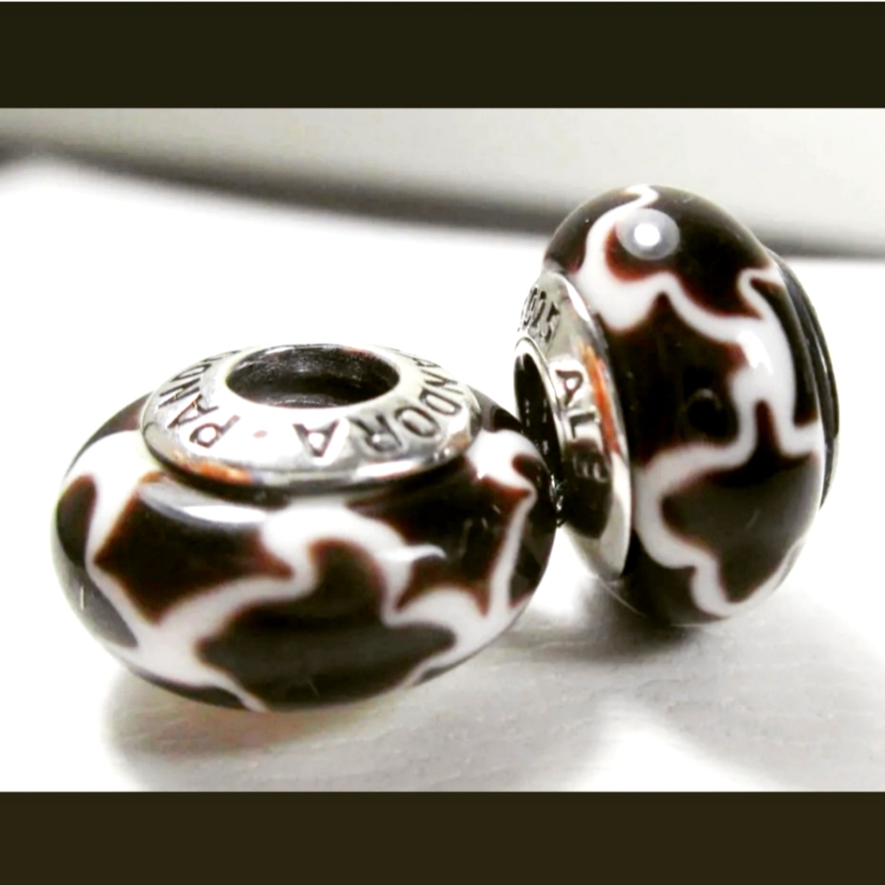 BRAND NEW PAIR of authentic Pandora charm muranos retired " Masai giraffe black